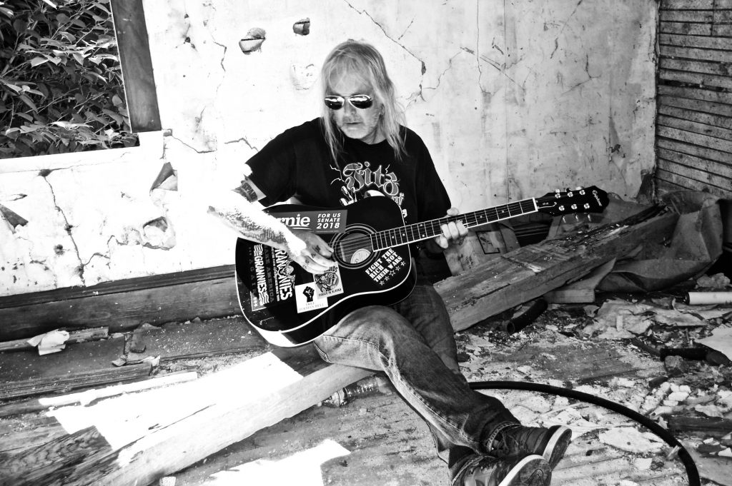 sluggo cawley guitar seated punk rock REQ'D REQD band black and white